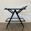 Pamono Black-Stained Beech Wood Trolley with Metal Wheels and Glass Shelves, 1950s Clearance
