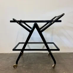 Pamono Black-Stained Beech Wood Trolley with Metal Wheels and Glass Shelves, 1950s Clearance