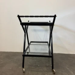 Pamono Black-Stained Beech Wood Trolley with Metal Wheels and Glass Shelves, 1950s Clearance