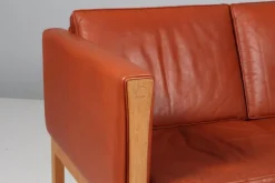 Pamono Danish Two-Seat Sofa in Leather and Oak by Hans J. Wegner, 1960s Clearance