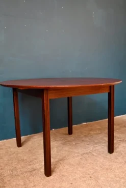 Pamono Italian Round Oval Rosewood Dining Table with Extension, 1970s Hot