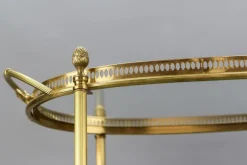 Pamono Mid-Century Modern 2-Tier Brass and Glass Bar Cart in the style of Maison Baguès, 1950s Online