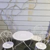 Pamono Mid-Century Wrought Iron Garden Table and Chairs, 1950s, Set of 4 Sale