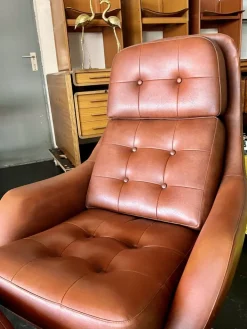 Pamono Set of Vintage Vinyl Leather Lounge Swivel Chair and Ottoman in Cognac Brown, 1970s