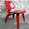Pamono Stained Red LCW Lounge Chair by Charles & Ray Eames for Herman Miller / Evans Products Company, 1948 Hot