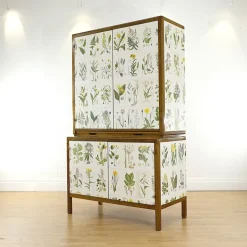 Pamono Swedish Modern Cabinet with Nordens Flora Illustrations by C.A.M Lindman, 1940s Clearance