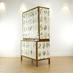 Pamono Swedish Modern Cabinet with Nordens Flora Illustrations by C.A.M Lindman, 1940s Clearance