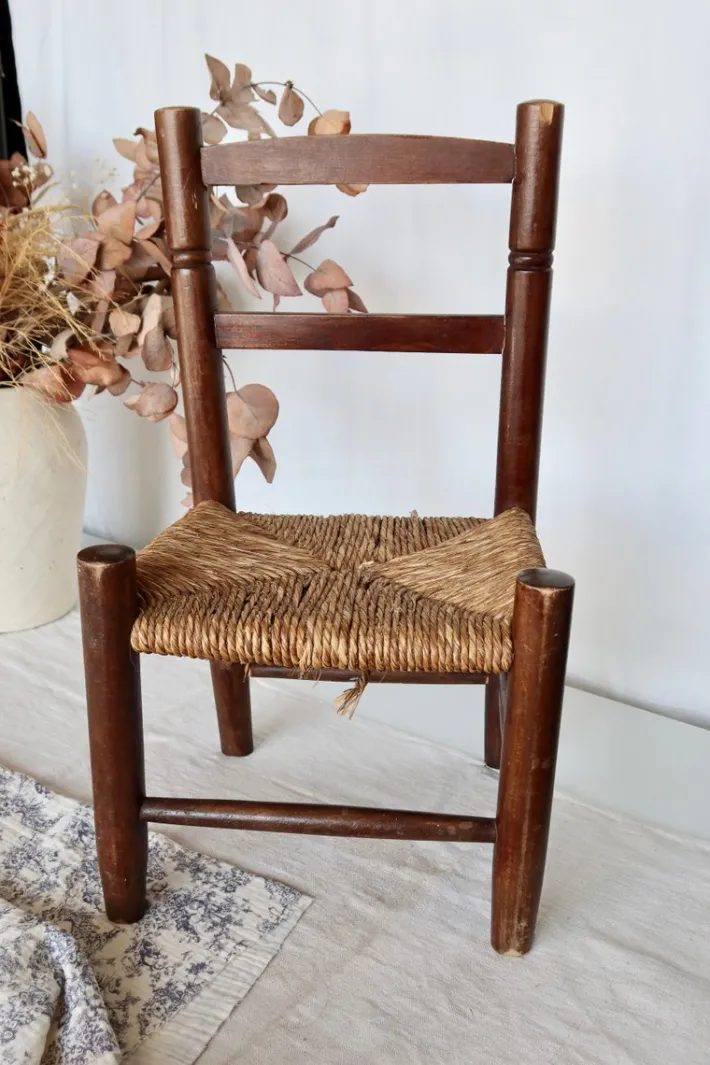 Pamono Vintage Children's Chair in Dark Wood with Woven Straw Seat, 1980s Discount