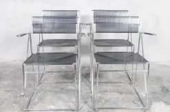 Pamono X Line Black Dining Chairs by Niels Jørgen Haugesen for Hybodan, Set of 4 New